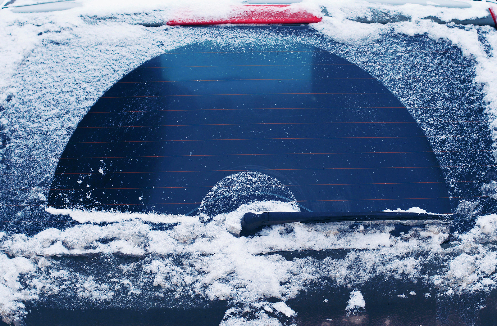 Winter frozen back car window texture freezing ice glass background
** Note: Shallow depth of field